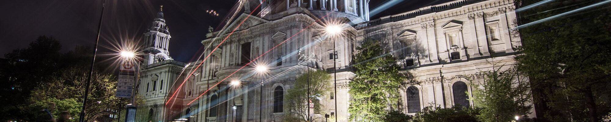 St Pauls Cathedral at night with cars whooshing past